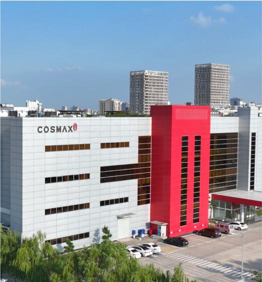 OSMAX China building exterior, white facade with vertical red-accented structure